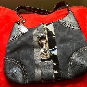 Coach Black and Gold Shoulder Bag  authentic very stylish bag Buckle works.